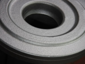 Reinigungsstrahlen - Laufrolle gestrahlt